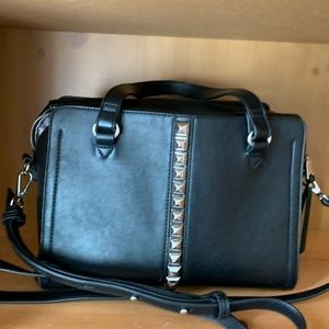 INC black pocketbook.